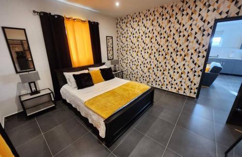 Tera Kora Apartment | Modern sunshine yellow apartment with nature views