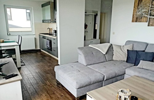 Ziemitz Condo | Modern vacation apartment with balcony directly on the Peene