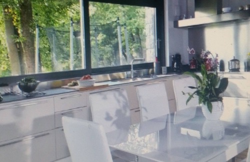 Perledo Villa | Modern Violet House - The villa offers spectacular views of Lake Como
