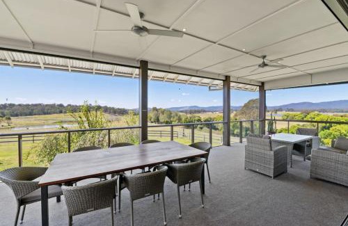 Tamborine House | Mountain Majesty with Poolside Relaxing Getaway