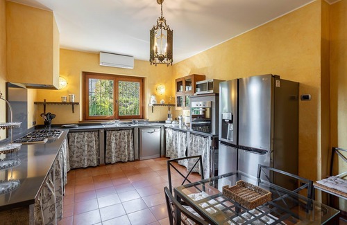 Solcio Villa | My Rental Homes - Villa Brin with tennis court, private sandy beach and dock