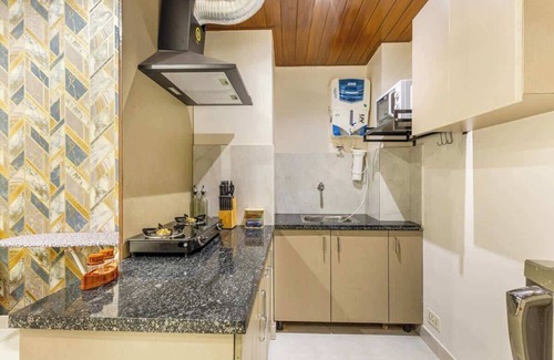 Sector 40 Apartment | Nature-inspired luxury 1 BHK
