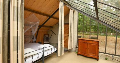 Lomm House | Natuurslaapkamer de zaadeest boskamer