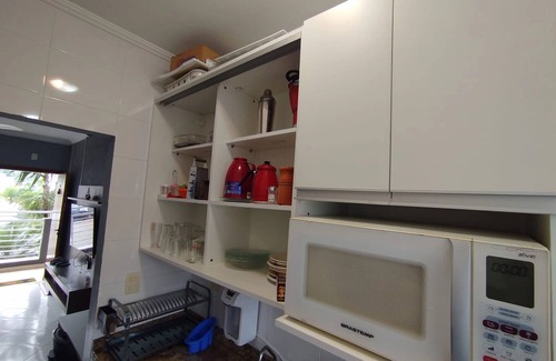 Downtown Ubatuba Apartment | NEAR THE BEACH AIR CONDITIONING WI-FI POOL BARBECUE CHAIR SUNSHINE SMART TV FILTER