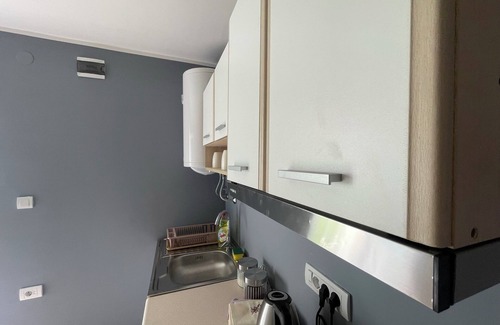 Becej Apartment | nEnchanting apartment complex with a stunning yard, gym, and sports equipment.