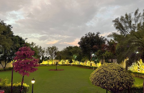 Alwar Other | Nestled amidst majestic mountains, our farmhouse offers a serene and picturesque