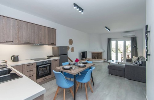 Alonia Apartment | Nestled on the ground floor with direct garden access amidst olive trees