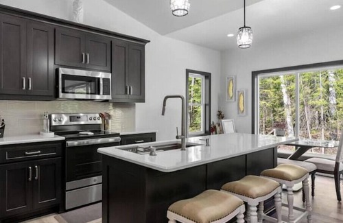 Jacksonport House | New, charming custom home, 7 minute walk to the beach