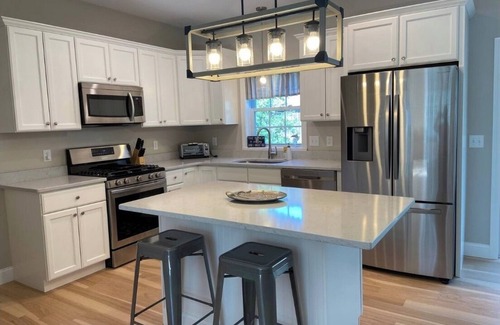 Kenyon House | New Home, AC, Beach Passes, Hot Tub, EV Charger, Linens, & No Cleaning Fee!