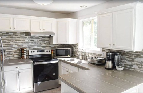 Roy House | NEW Large Updated Home+Huge Fully Fenced Yard+Hot Tub+Gazebo+BBQ+Outdoor Dining!