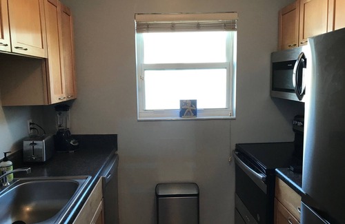 Central Beach Condo | NEW LISTING! 2 bdrm/1 bath. 5-min walk to Beach. Pool & Parking