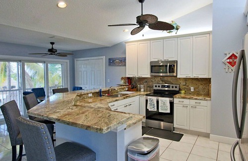 Venetian Shores Villa | New Listing Canal Home Snake Creek with Bay&Ocean Access Tiki&Pool 100ft Dockage