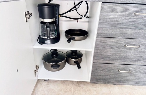 Oranjestad Apartment | New Modern 1B Apt Kitchen & TV