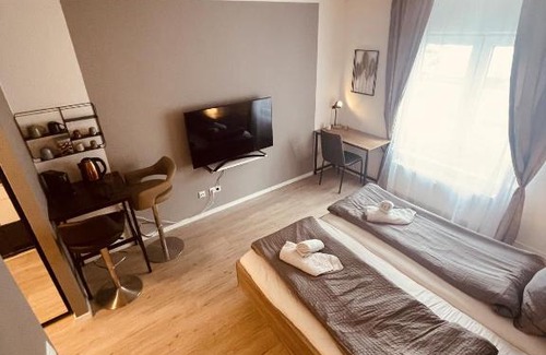 Hartenberg-Munchfeld Apartment | New Modern Apartment City Center 03