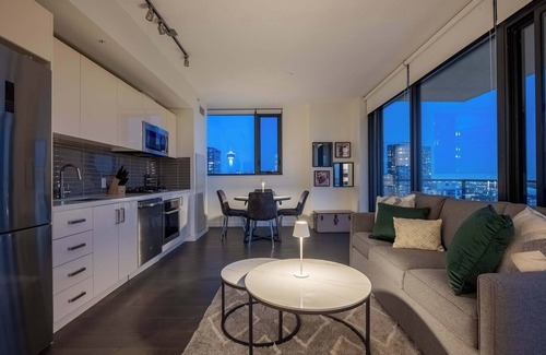 Connaught Condo | NEW! Poolside Bliss: 22FL DT Tower View FREE Banff Pass, Gym, Wine!