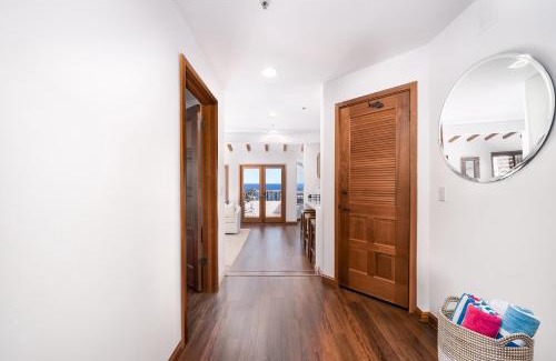 Avalon Apartment | NEW! Premium Ocean Views, Corner Condo with Fireplace and Golf Cart