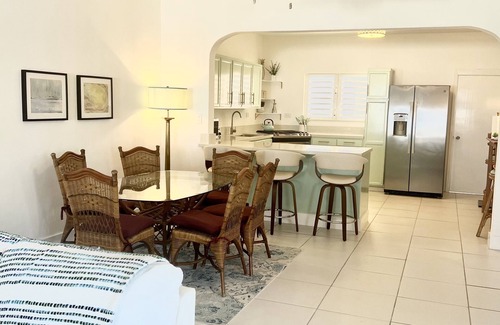 West End Village House | Newly Renovated Luxury West End Home Steps to Mead’s Bay and the Four Seasons.