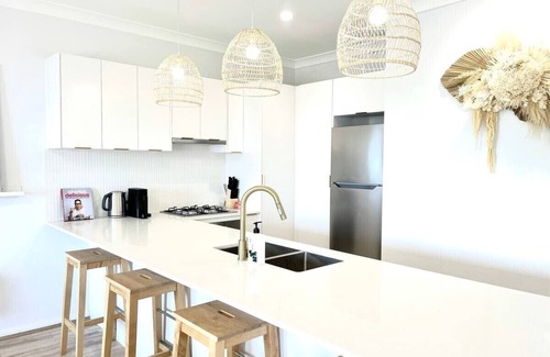 Gosford Apartment | Newly renovated top floor apartment with beautiful views and a pool to enjoy.
