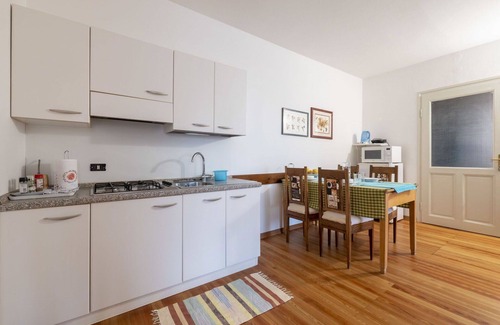 Vito d'Asio Apartment | Nice apartment for 4 people with pool, WIFI, TV, patio, pets allowed and parking