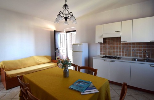Northern Sardinia Apartment | Nice apartment for 4 guests with WIFI, pool, TV, balcony and parking, close to Castelsardo