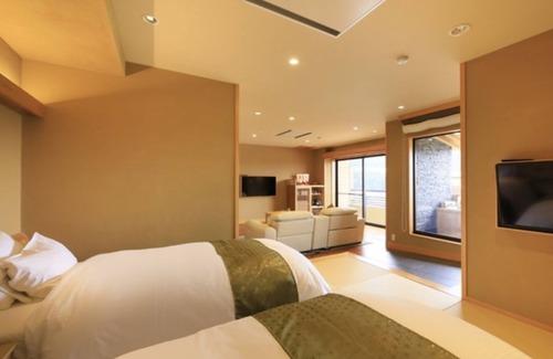 Yudanaka Shibu Onsen Hotel | Nonsmoking Japanesestyle room with openair bath Issanoma River view | Room only /Shimotakaigun Nagano