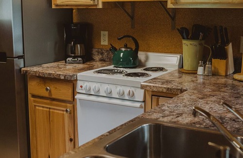 Seeley Lake Cabin | Nordic Cabin at Tamaracks Resort, a cozy log cabin with views of Seeley Lake.