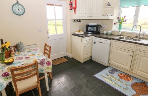 Angle Cottage | NORTH STUDDOCK COTTAGE, pet friendly, with open fire in Pembroke