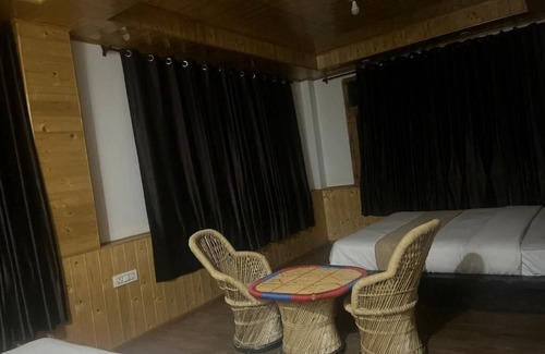 Cheog Hotel | Norvin Homes- Family Room/breakfast included