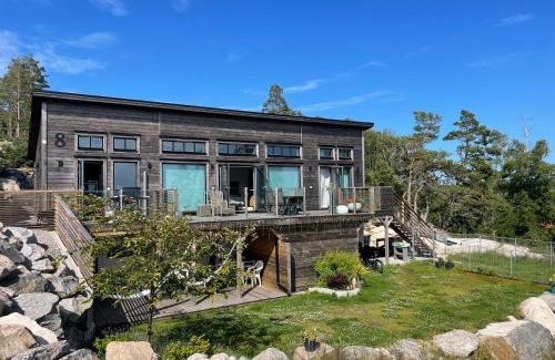 Lokholmen Apartment | Ny lägenhet på markplan med havsutsikt