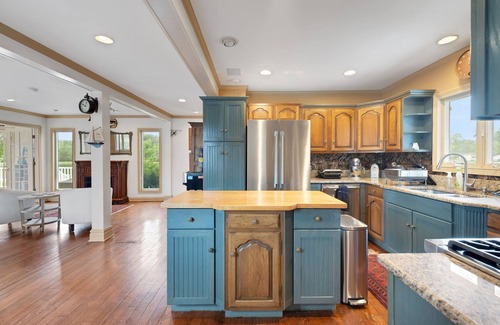 Wolverine Lake House | Oak Island: Waterfront Bliss with Hot Tub and Sandy Beach