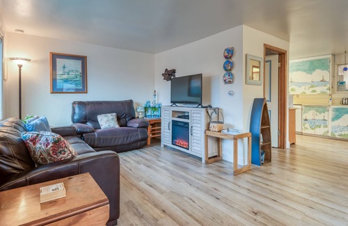Nelscott House | Oceanviews, deck, bbq and easy beach access await at this pet friendly home