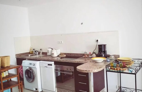 Essaouira Coast Apartment | On the Beach you see Horses and Quad Riders
