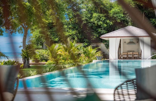 Sunset Crest Villa | One Beachlands - Luxury Beachfront Mansion