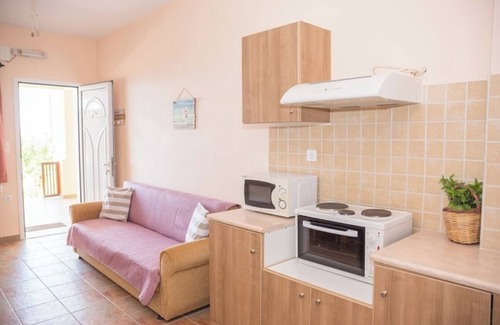 Thermisia Apartment | One-Bedroom Apartment with Sea Views and Olive Grove Serenity for Up to 4 Guests
