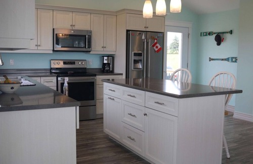 Clinton House | Open Concept 4 Bedroom Cottage Overlooking The Southwest River