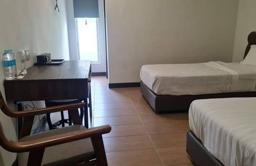 Kampung Berjaya Hotel | OYO 90866 Rakyat Inn