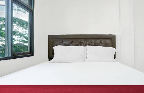 Singkawang Hotel | OYO 92609 Guest House Malay Singkawang