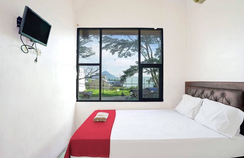 Singkawang Hotel | OYO 92609 Guest House Malay Singkawang