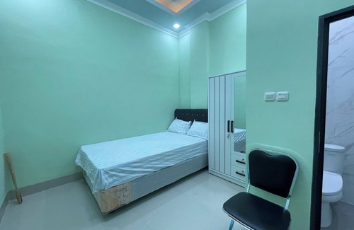 Kendari Hotel | OYO 93664 Homestay Purirano