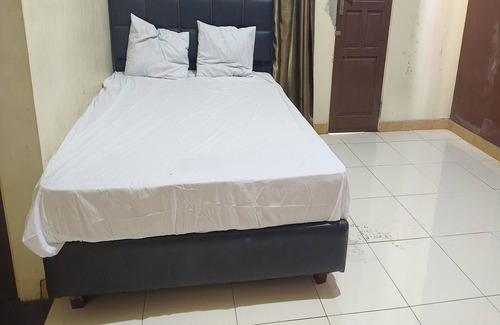 Marabahan Hotel | OYO 93752 Aglo Homestay NearYani Heahlerr