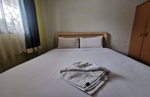 Borneo Hotel | OYO 94121 Widan Homestay