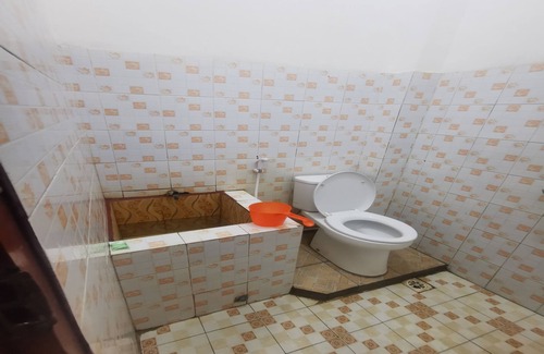 Borneo Hotel | OYO 94121 Widan Homestay