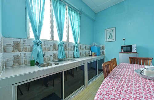 Pasir Puteh House | OYO Home 90325 Au Homestay