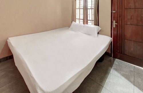 Muncan House | OYO Life 92846 Kost Putra Griya Eka