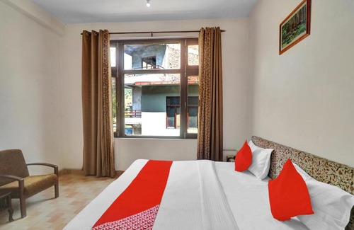 Bajaura Hotel | OYO Rudhra River Huts