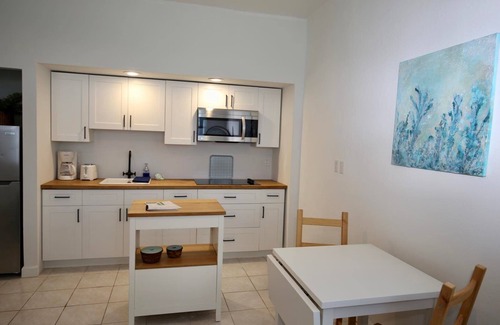 Cockburn Town Apartment | Palmeira - Coral Suite - Quiet Retreat - Bicycles Included