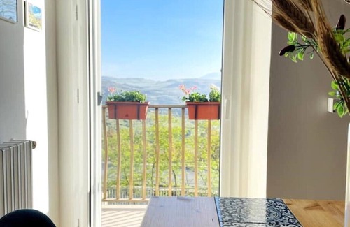 Caltagirone Apartment | Panoramic loft in front of villa. Rome Street