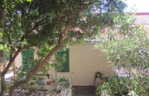 Porto Alabe Villa | Panoramic sea front housewith garden and beach directly below
