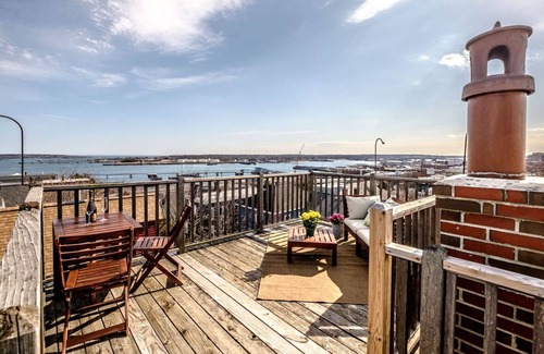 East End Apartment | Panoramic Water, Island & City Views w/Private Roof Deck