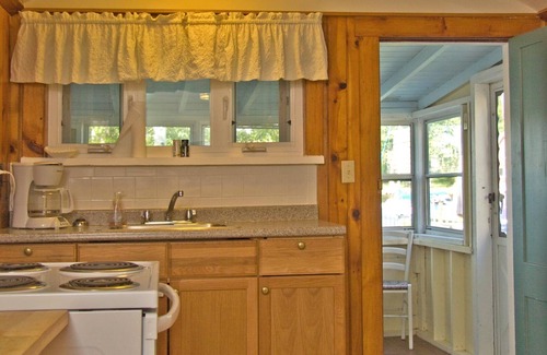 Gilford Cottage | papoose Cozy lakefront rental for two with private beach